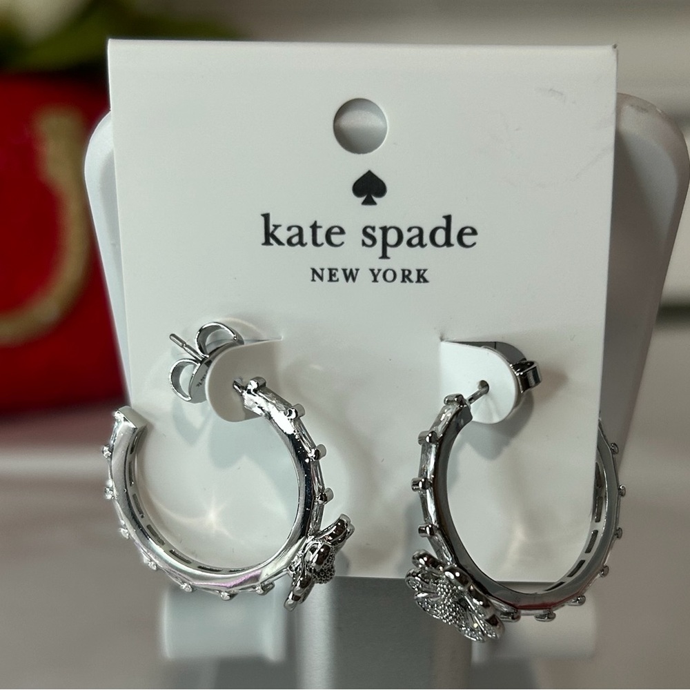 Kate Spade silver earrings with flower